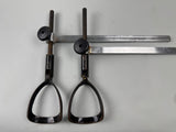 Pair set two Midmark Ritter Table Stirrups chrome base black feet guides